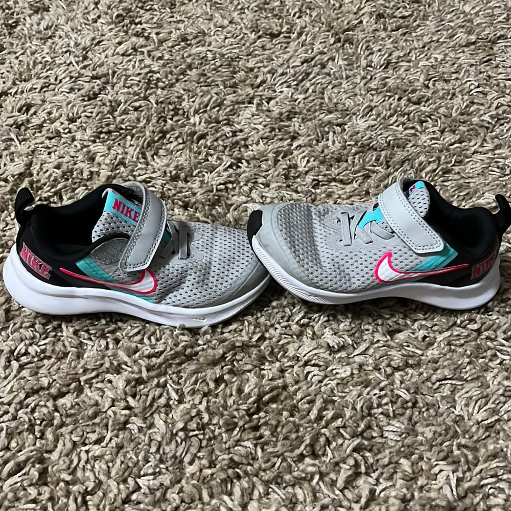 Girls Nike Gray and Pink running shoes size 11c